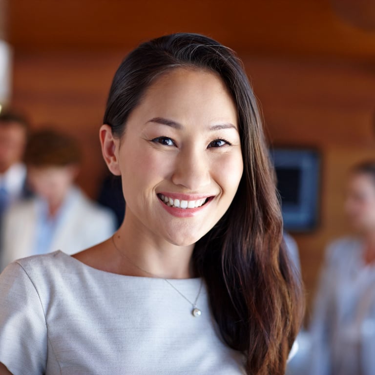 Woman with a bright smile, representing cosmetic dentistry services