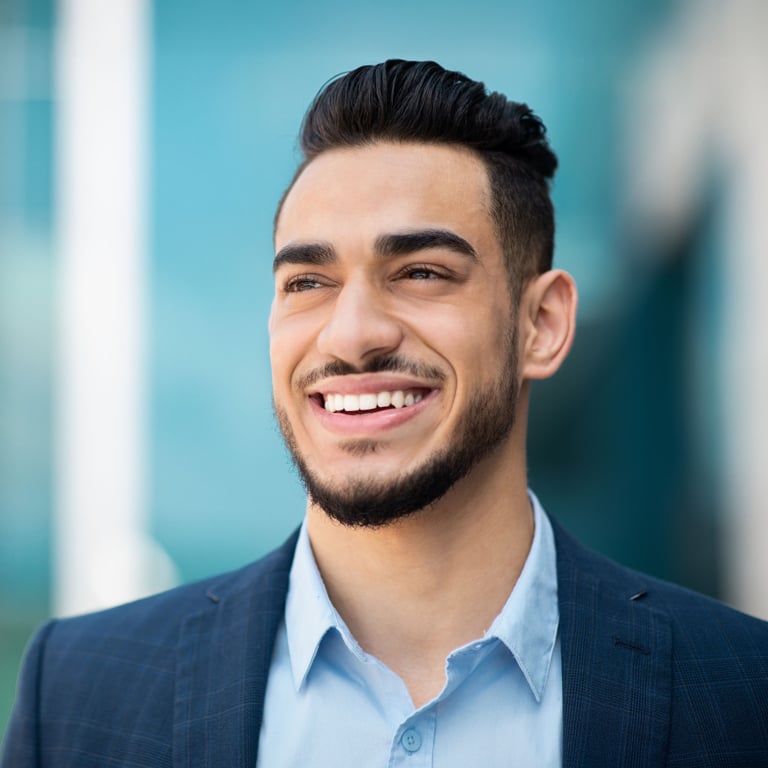 Man showcasing a confident smile, symbolizing implant dentistry solutions