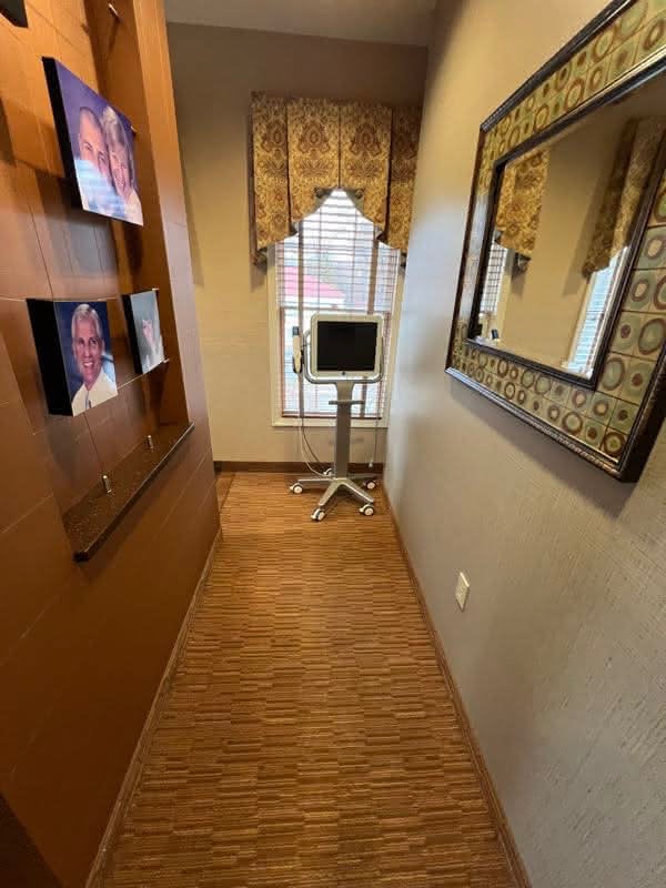 A scanner in a hallway with a window