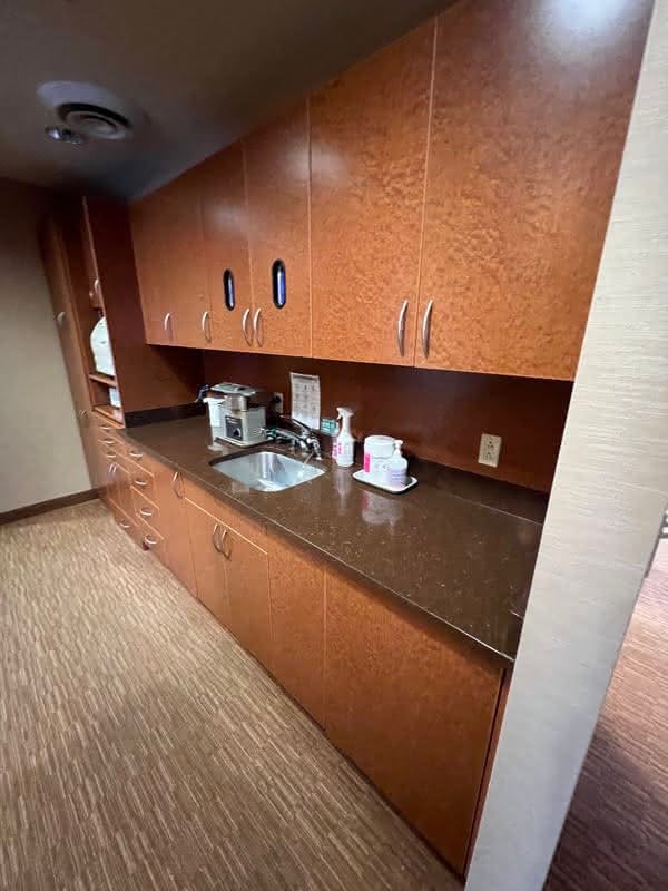 Advanced sterilization area featuring equipment on a black counter