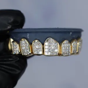 Custom yellow gold top grillz fully set with princess-cut and round diamonds in a channel and pavé pattern, covering multiple upper teeth, shown on a dental cast